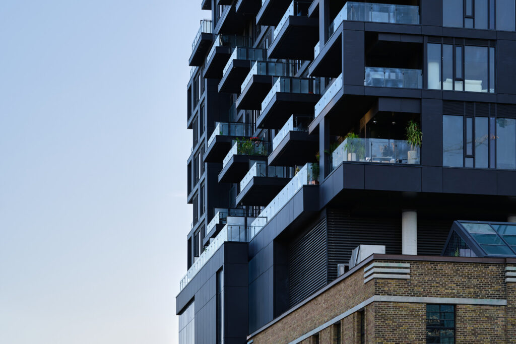A closeup of Waterworks Residences showing the windows and balconies