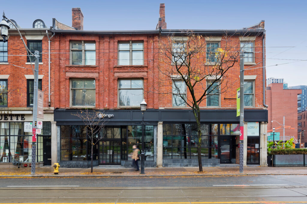 105-109 King Street West with people walking in front of it