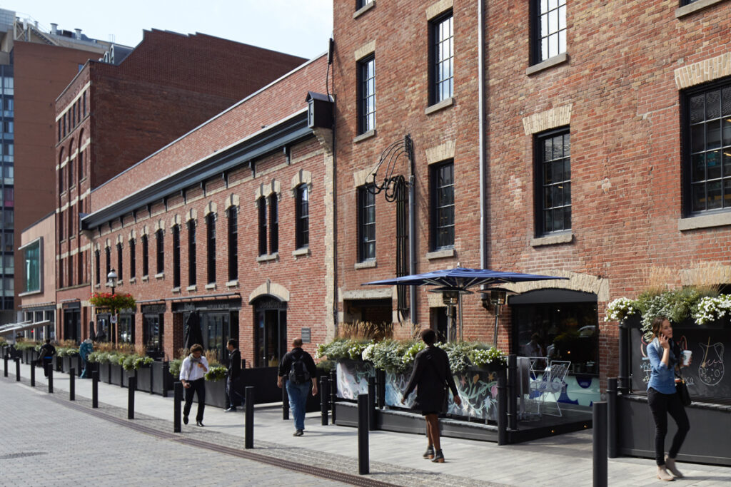 Market Street with people walking in front of it