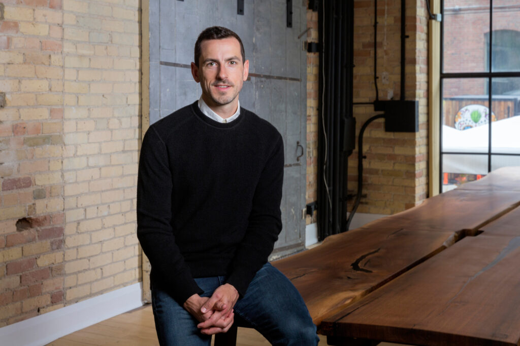 Stratton Townley sitting on a bench